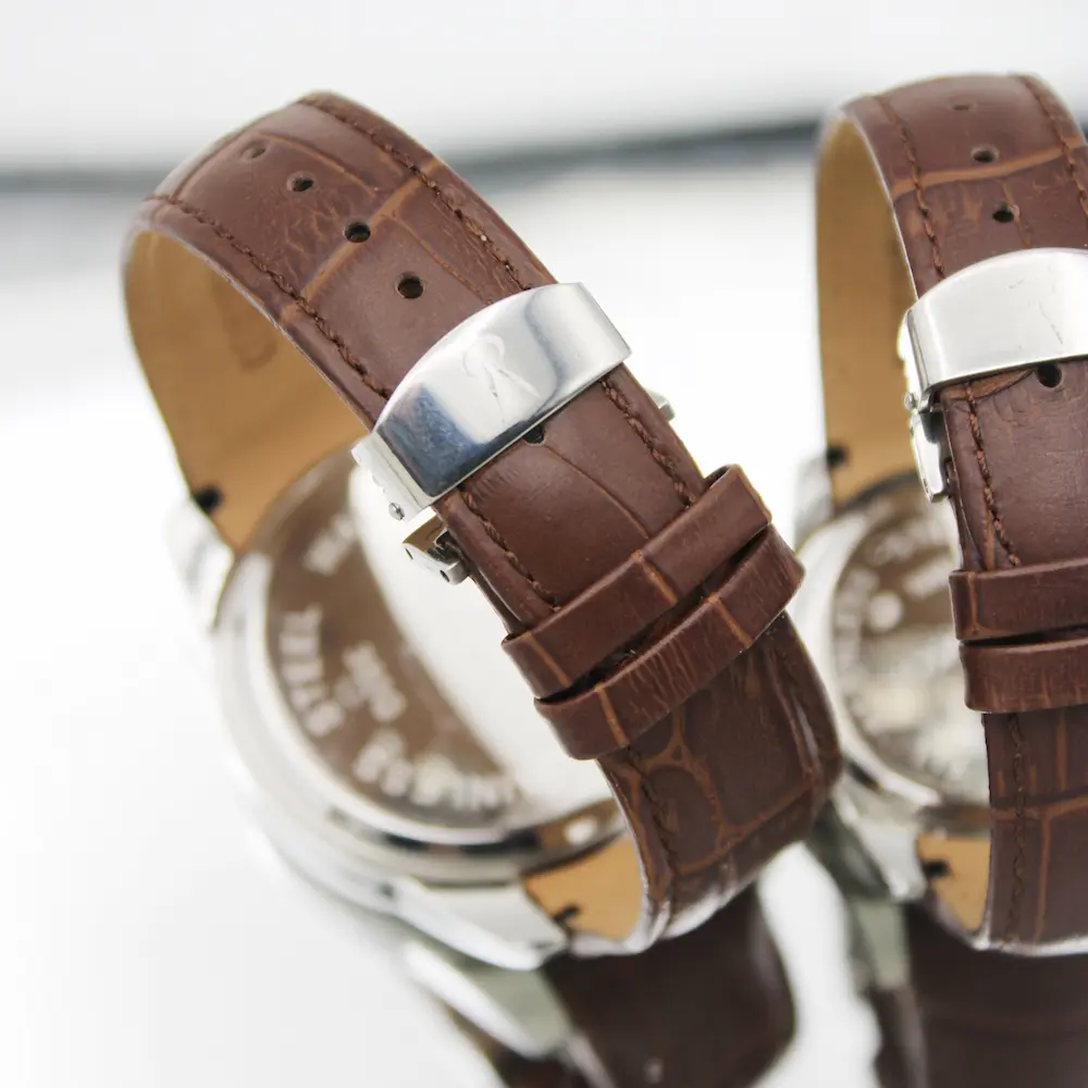 ساعت مچی عقربه ای ست زنانه و مردانه رومانسون مدل 350